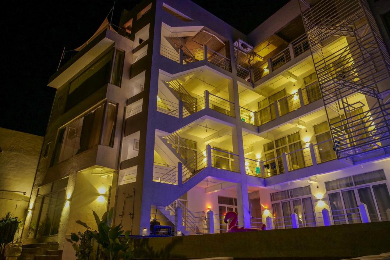 Sugarsea Inn & Dive Shop ماكتان المظهر الخارجي الصورة