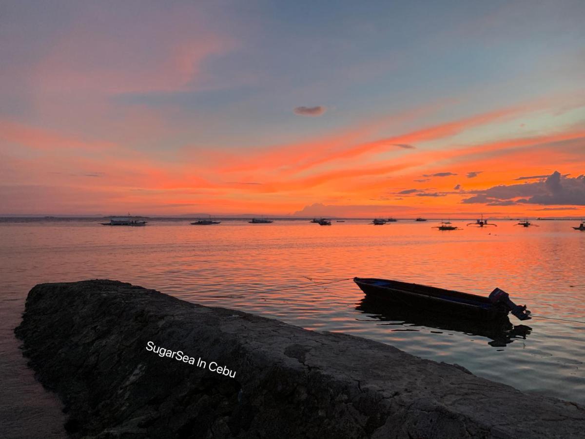 Sugarsea Inn & Dive Shop ماكتان المظهر الخارجي الصورة
