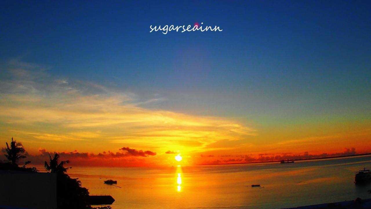Sugarsea Inn & Dive Shop ماكتان المظهر الخارجي الصورة