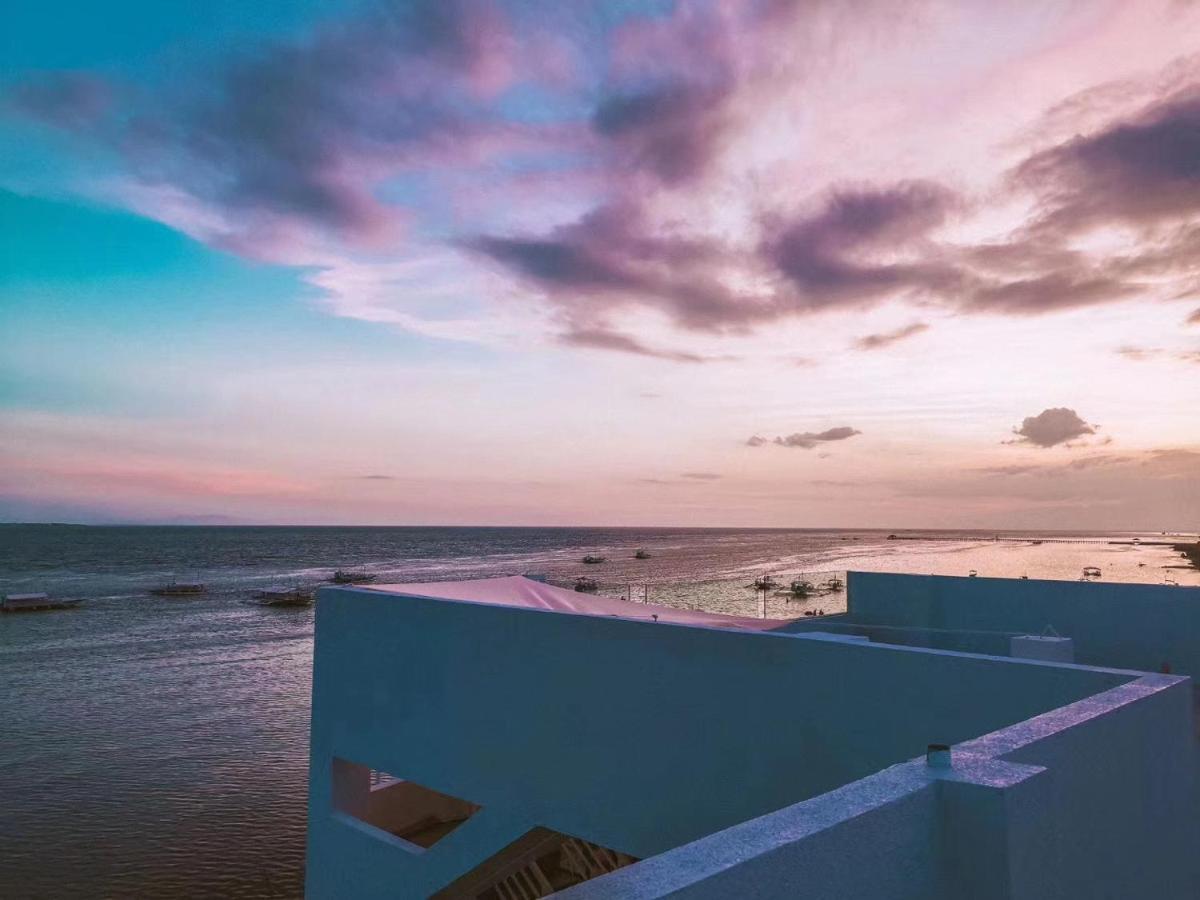 Sugarsea Inn & Dive Shop ماكتان المظهر الخارجي الصورة