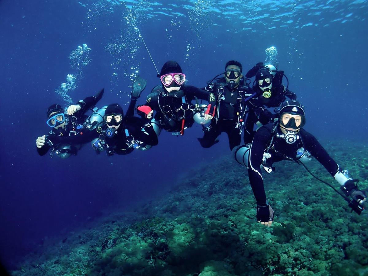 Sugarsea Inn & Dive Shop ماكتان المظهر الخارجي الصورة