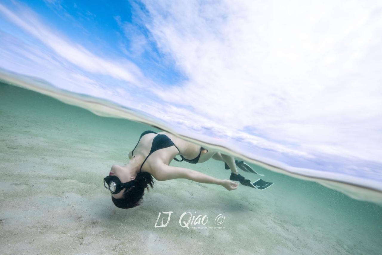 Sugarsea Inn & Dive Shop ماكتان المظهر الخارجي الصورة