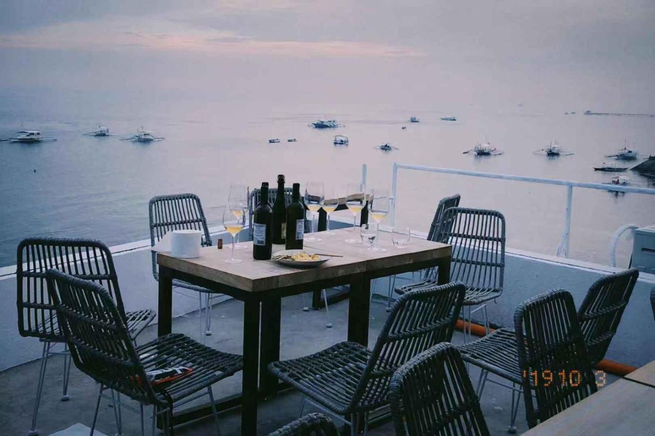 Sugarsea Inn & Dive Shop ماكتان المظهر الخارجي الصورة