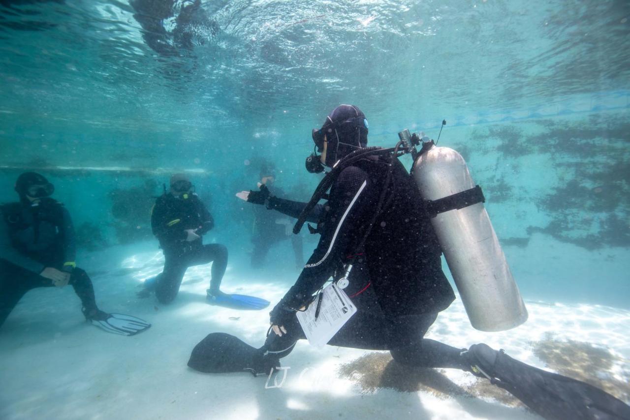 Sugarsea Inn & Dive Shop ماكتان المظهر الخارجي الصورة