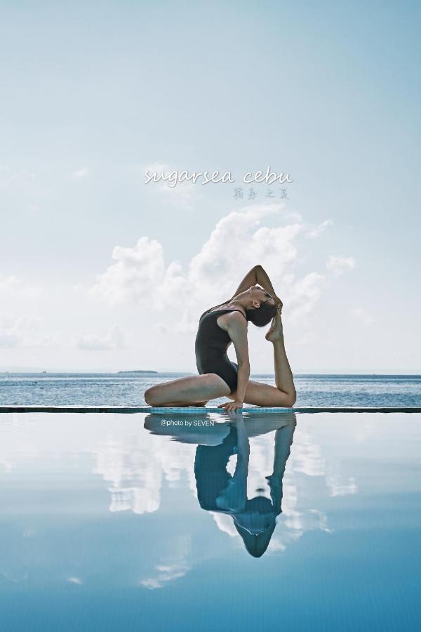 Sugarsea Inn & Dive Shop ماكتان المظهر الخارجي الصورة